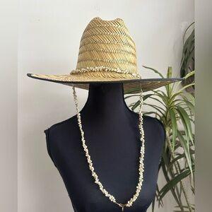 Straw beach hat with shell chain straps